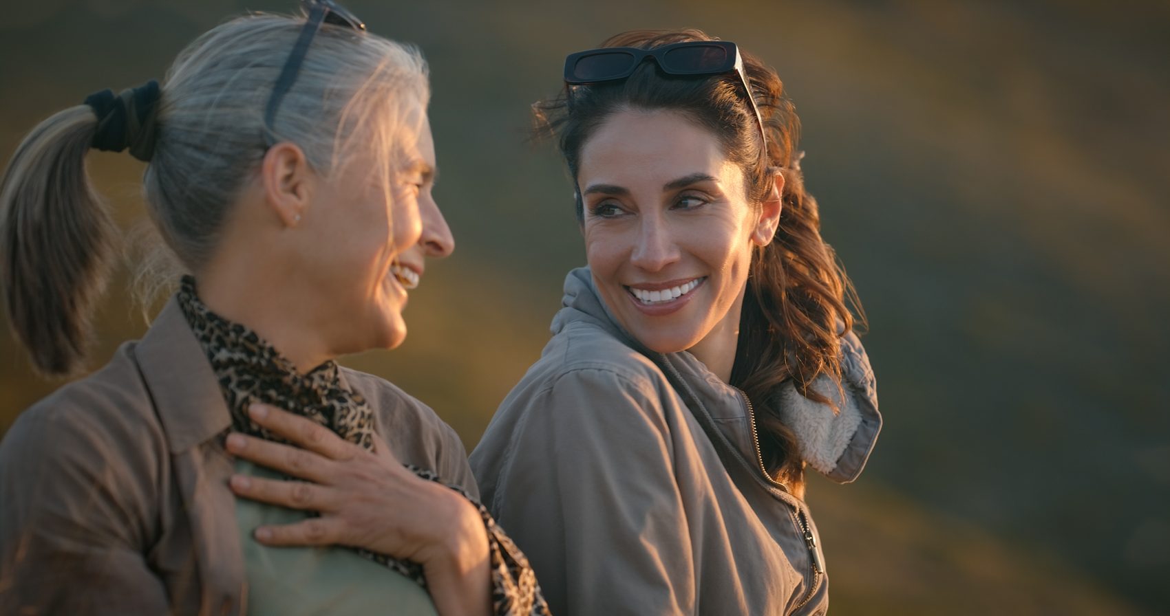 Two women together in the warm evening light
